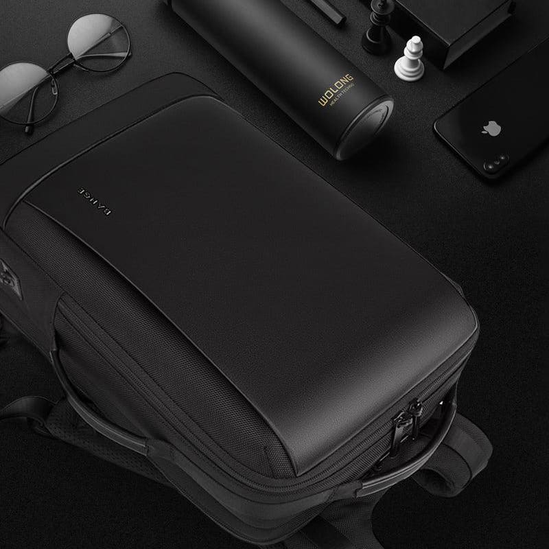 Bange Premium waterproof 35l executive backpack with headphone jack and USB port for charging a cell phone battery
